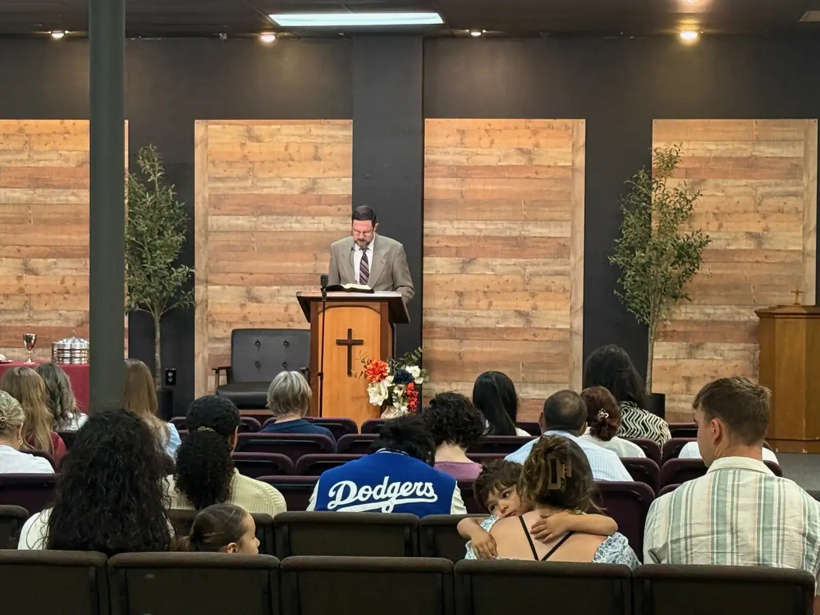A minister preaching the Word of God to the congregation